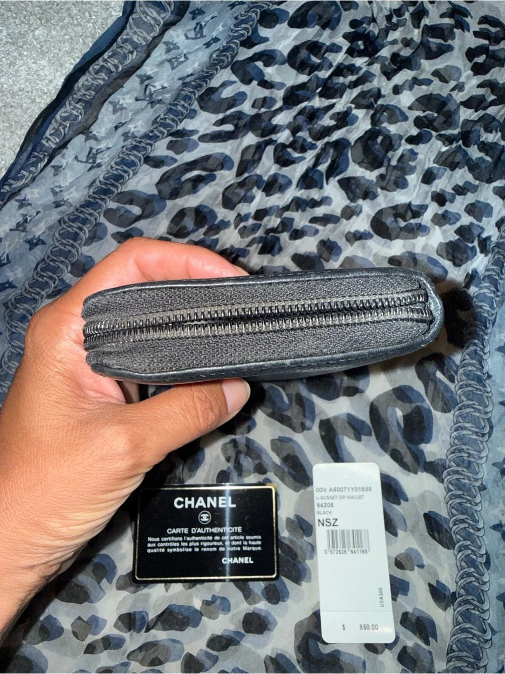 Authentic CHANEL Black Caviar Leather Zip-Around Wallet with Embossed CC